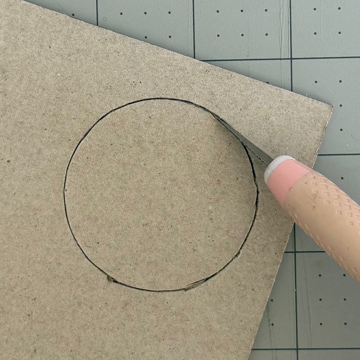 Continuing around the traced circle with short controlled cuts