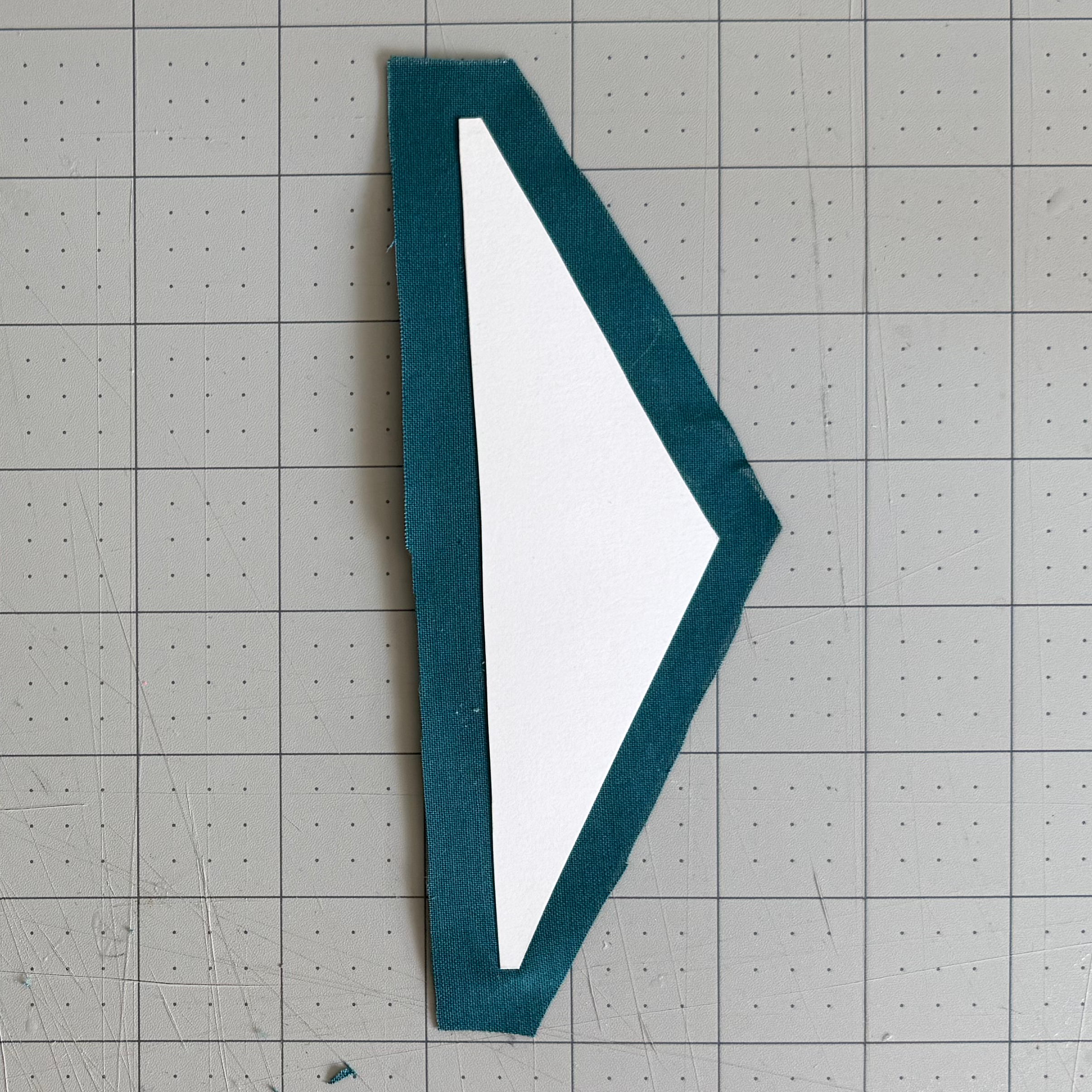An irregular shape cut from cardstock