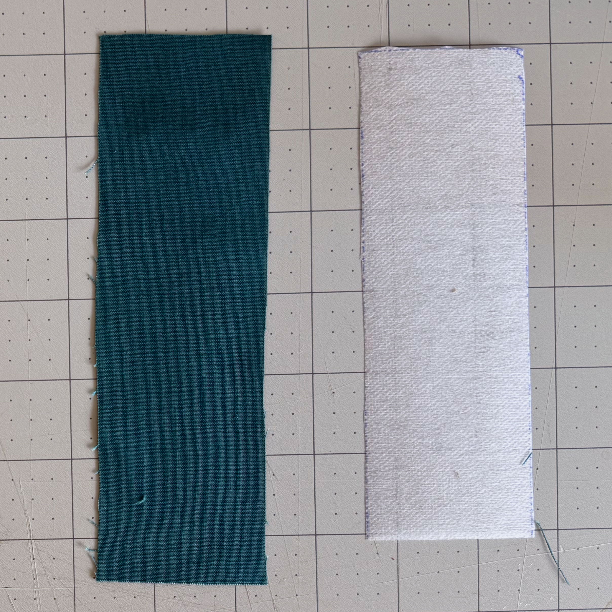 Fabric and fusible interfacing cut for a hinge support